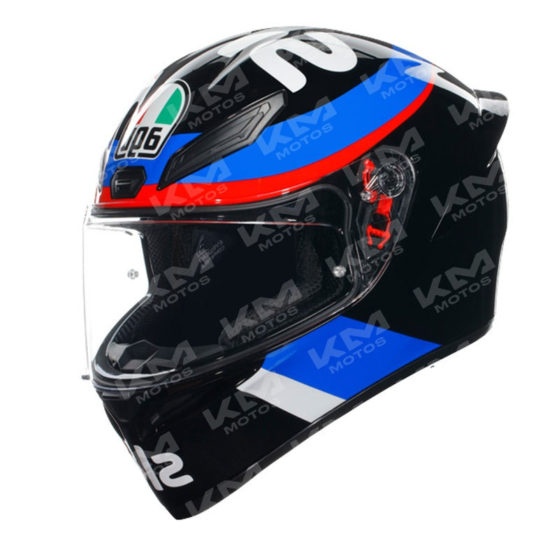 Casco de carreras VR46 cerrado de Orix en colores multicolor, diseño aerodinámico y protección para pilotos de motociclismo.
