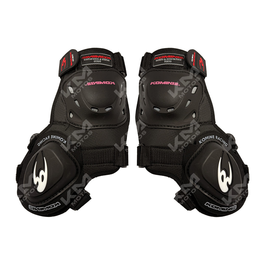 Rodilleras de racing negras con sliders KMS, protección y soporte para deportes de velocidad y competición.
