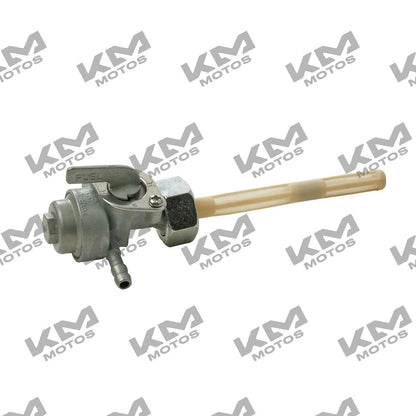 Válvula de combustible KM Motos 125ZII, llave de paso de combustible, con cuerpo metálico y manija para control de flujo.
