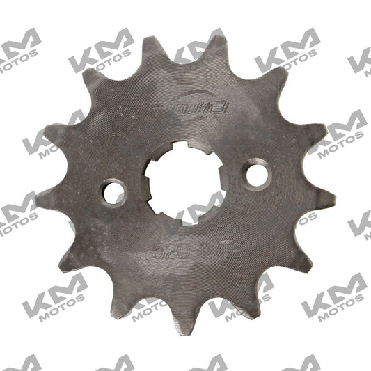 Piñón delantero 13T de sistema de tracción Italika FT200 DM150 ZX250, parte original E06030115, en color metálico.