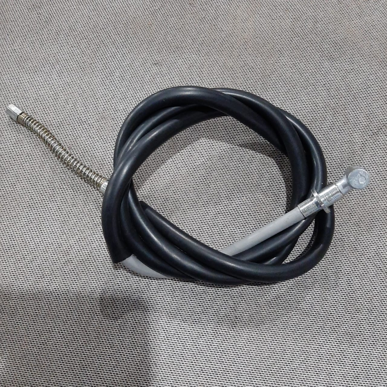 CABLE DE FRENO TRASERO LH RE205