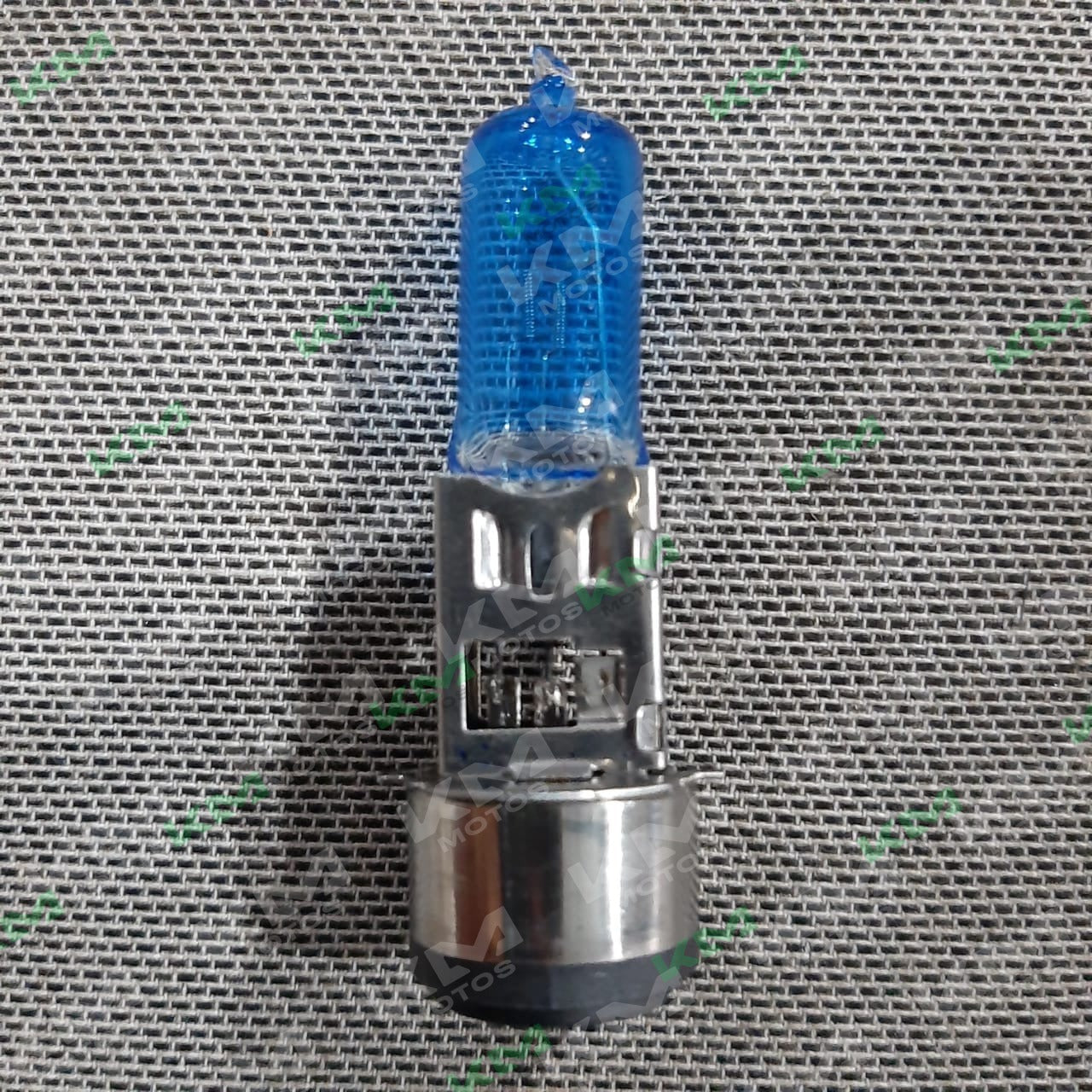 Foco halógeno con 2 contactos y luz azul, marca KM Motos, imagen que muestra la bombilla en su empaque o ensamblada