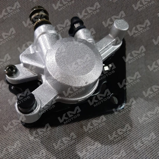 Caliper delantero para YBR125-G TT de la marca Ki, muestra la mordaza y componentes del sistema de freno.