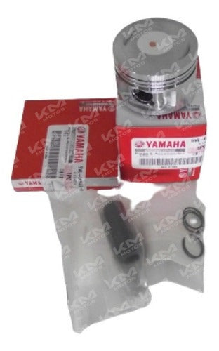 Kit de pistón STD de 54.00mm para YBR125 de la marca Hanzo, con componentes visibles en la imagen.
