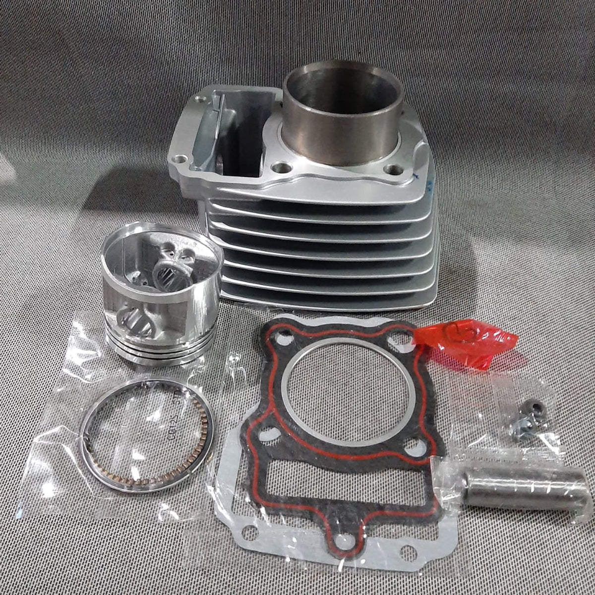 Kit de cilindro completo para motos CG125, HJ y STD de KM Motos, muestra detalles del cilindro y componentes en la imagen.