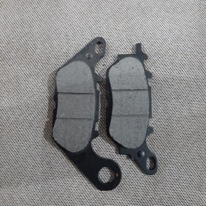 Pastillas de freno KM Motos YBR125-G TT modelo nuevo, componentes de freno para motocicleta en la imagen.