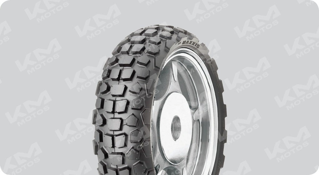 Llanta trasera Maxxis 130/70-12 para semitractora, muestra el neumático con banda de rodadura y marca Opin/Guzack.