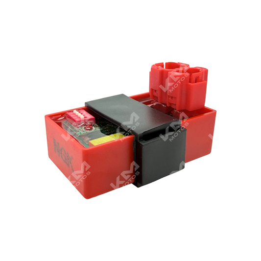 Interruptor CDI redondo regulable para motores GY6-D/C de KM Motos, con conexiones y ajuste de rendimiento.