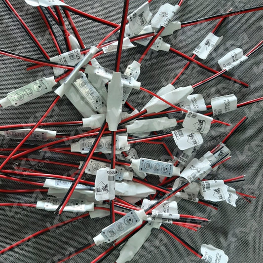 Módulo de flasheo Senli de 2L, dispositivo compacto para flasheo, con componentes electrónicos visibles.