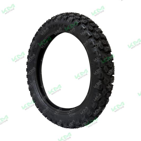 Llanta trasera semitractora KM Motos 110/90-17, neumático robusto para tractor, con banda de rodadura y estructura resistente.