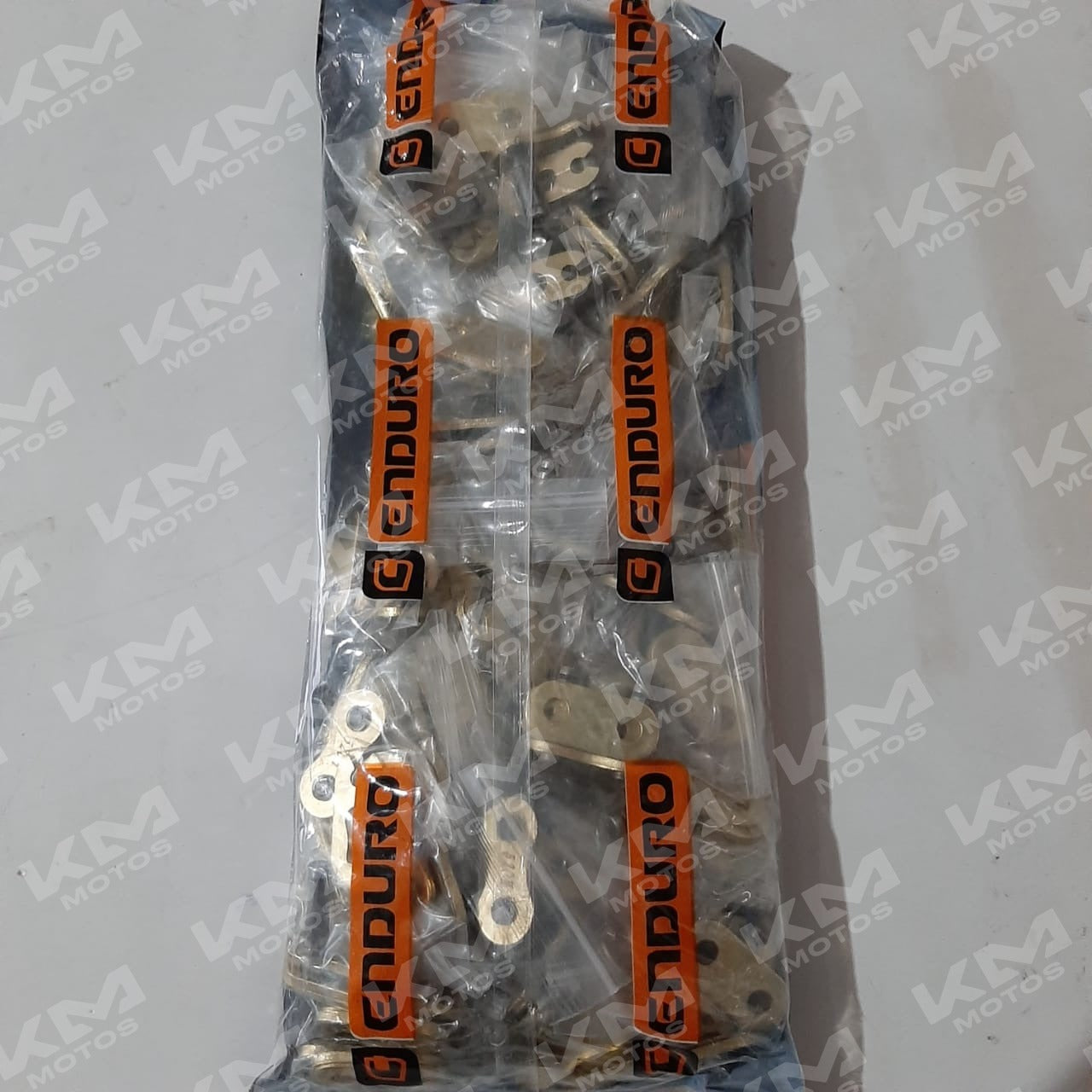 Seguro de Cadena 520H Dorado