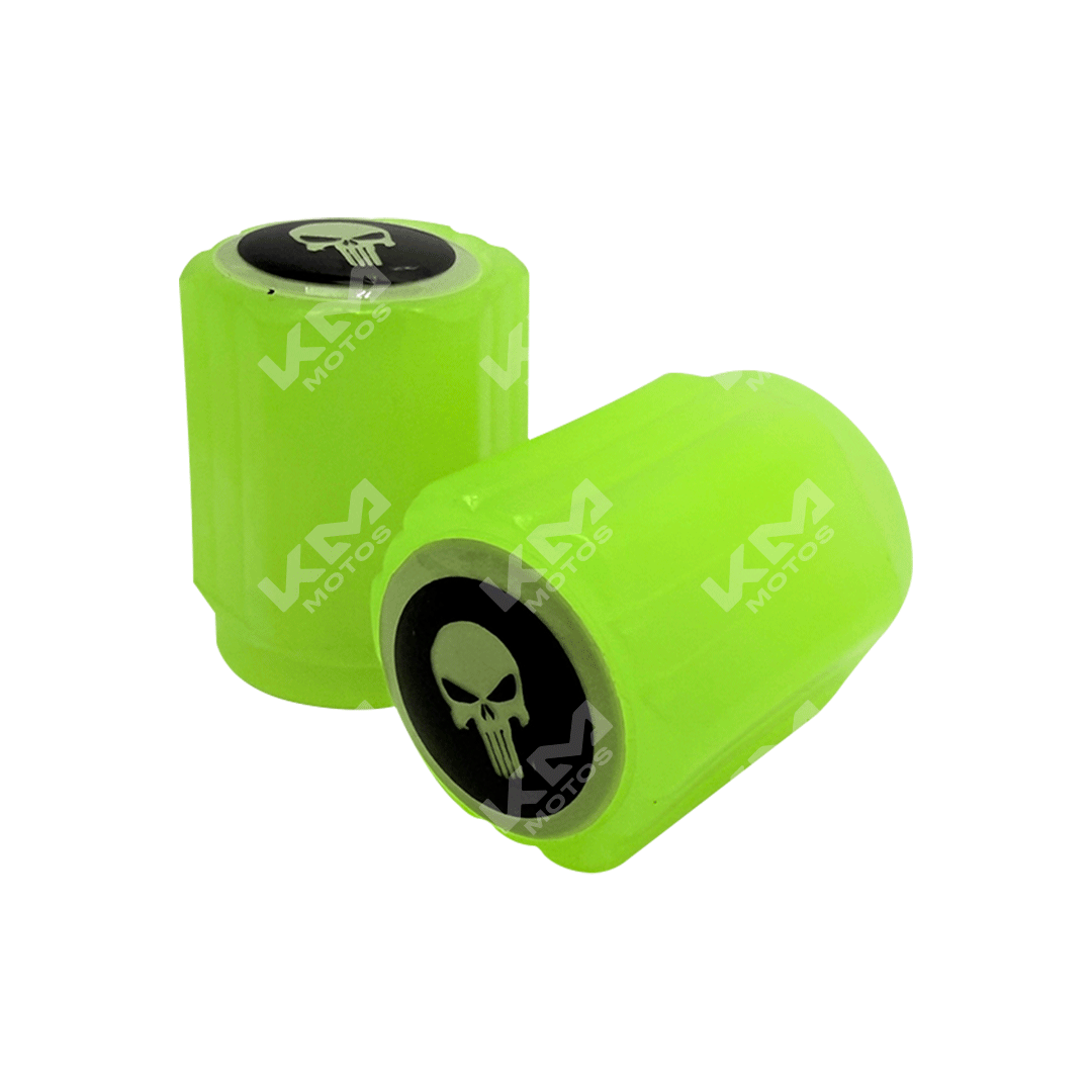 Tapones de válvula fluorescentes KMS, visibles en color brillante, diseñados para proteger y sellar válvulas en maquinaria.