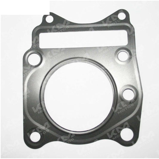 Empaque de culata Tvs King de la marca Universal, pieza de repuesto para motor, vista frontal del empaque.