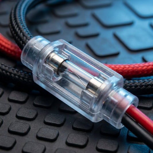 Porta fusible de hachita KMMOTOS, componente eléctrico con clip metálico y base plástica para protección en sistemas eléctricos
