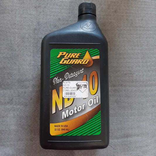Aceite ND-10 Pure-Guard para motos en envase de relleno, marca KM Motos, con etiqueta y contenido visible.