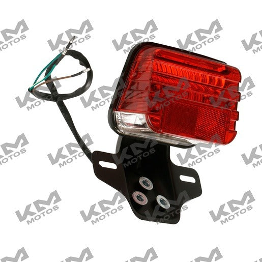 Conjunto de stop trasero para sistema eléctrico Italika Forza 125 FT125, pieza original, muestra la calavera trasera en color negro