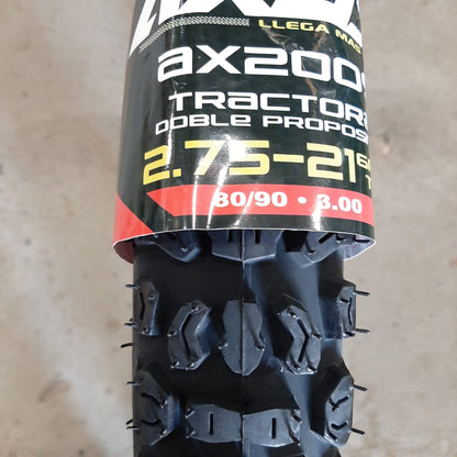 Llanta semitractora Universal 2.75-21 AXUS K270, neumático para tractor agrícola, vista de perfil en fondo blanco.